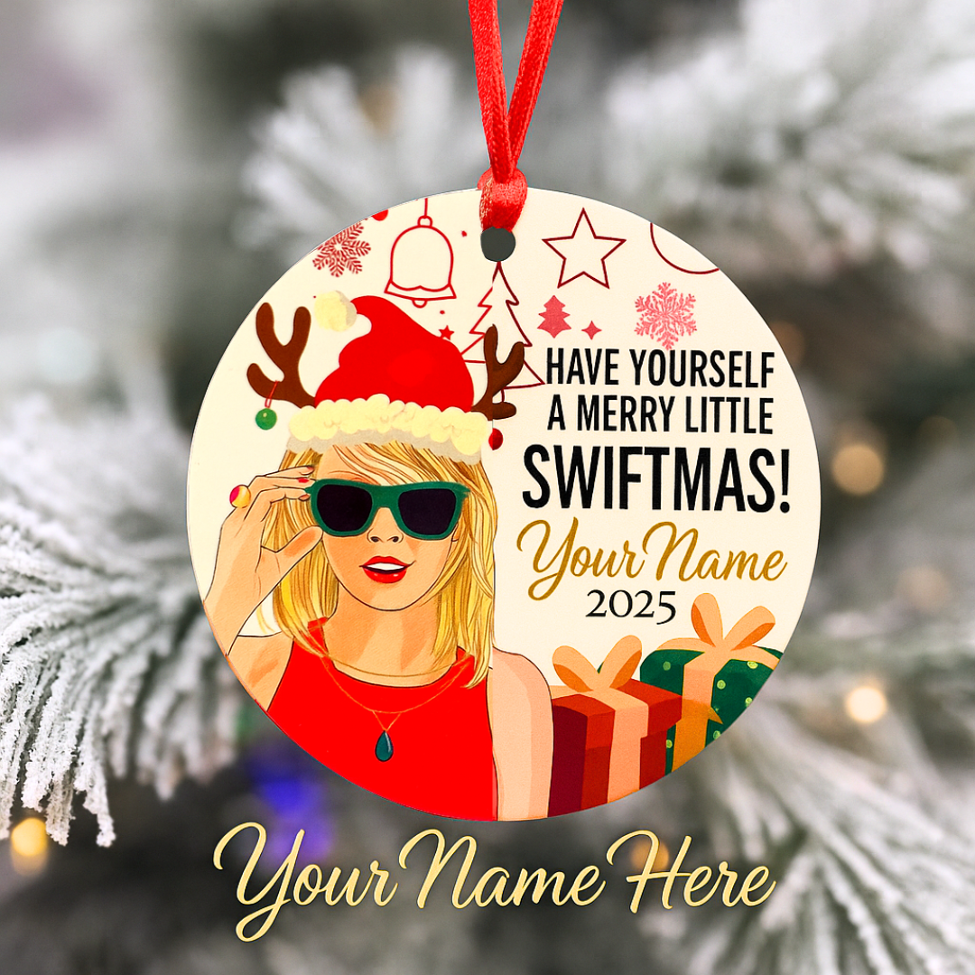 Personalized Swiftmas ornament hanging on Christmas tree with red ribbon and gifts — custom Swiftie fan holiday keepsake by XOXOPOP.